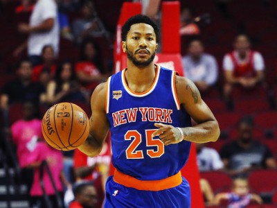 Derrick Rose of the New York Knicks takes the basketball up the court during their game against the Houston Rockets at the Toyota Center on October 4, 2016 in Houston, Texas. 