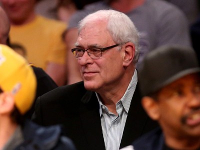 New York Knicks president Phil Jackson watches from the stands as his team plays the Los Angeles Lakers at Staples Center on March 12, 2015 in Los Angeles, California. The Knicks won 101-94.  