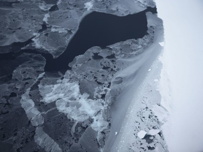 Sea ice floats near the coast of West Antarctica as seen from a window of a NASA Operation IceBridge airplane on October 27, 2016 in-flight over Antarctica.