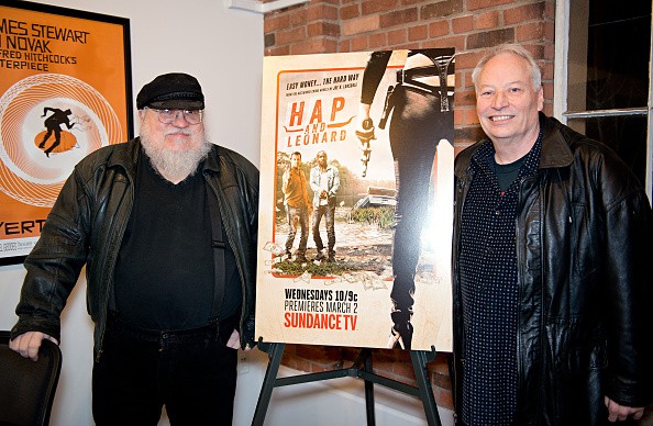 Writers George R. R. Martin and Joe Lansdale pose before SundanceTV's 'Hap & Leonard' Screening at the Jean Cocteau Theater on February 23, 2016 in Santa Fe, New Mexico. 
