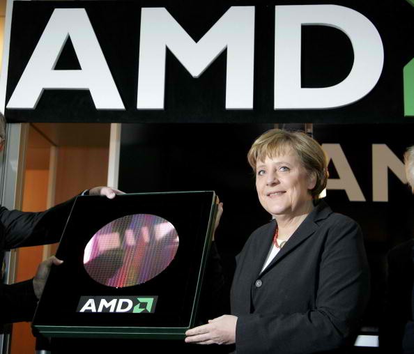  German Chancellor Angela Merkel presents one of the first 300 mm wafer of the AMD factory in Leipzig at CeBIT.