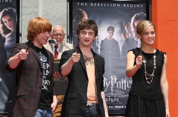 Actor Rupert Grint, actor Daniel Radcliffe and actress Emma Watson attend the Harry Potter cast 'Hand, Foot and Wand-Print' ceremony held at Grauman's Chinese Theater July 9, 2007 in Hollywood, California. 