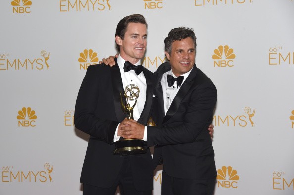 Actor Matt Bomer (L) and Mark Ruffalo, winners of the Outstanding Television Movie for 'The Normal Heart' pose in the press room during the 66th Annual Primetime Emmy Awards held at Nokia Theatre L.A. Live on August 25, 2014 in Los Angeles, California. 