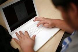 A student uses a laptop computer.