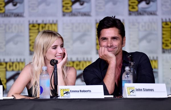 Actors Emma Roberts and John Stamos attended the "Scream Queens" panel during Comic-Con International 2016 at San Diego Convention Center on July 22 in San Diego, California.