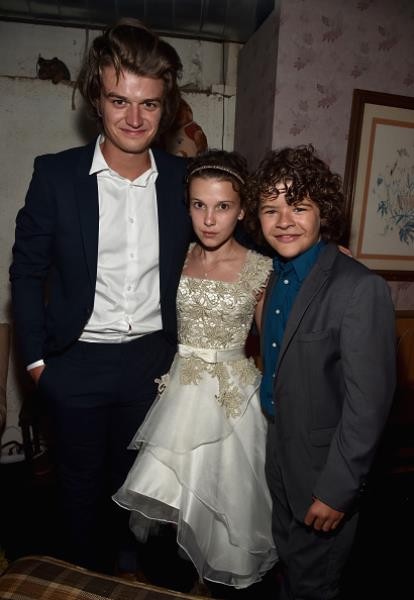Actors Joe Keery, Millie Brown, and Gaten Matarazzo attended the after party for the premiere of Netflix's “Stranger Things” at Mack Sennett Studios on July 11 in Los Angeles, California.