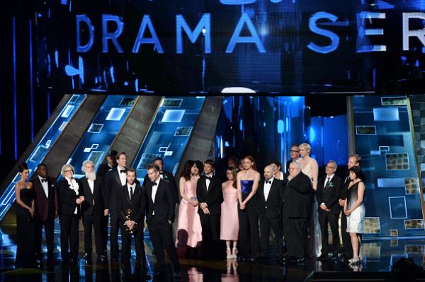 Writer/producers David Benioff and D.B. Weiss (at mic) with cast and crew accepted Outstanding Drama Series award for "Game of Thrones" onstage during the 67th Annual Primetime Emmy Awards at Microsoft Theater on September 20, 2015 in Los Angeles, Califor