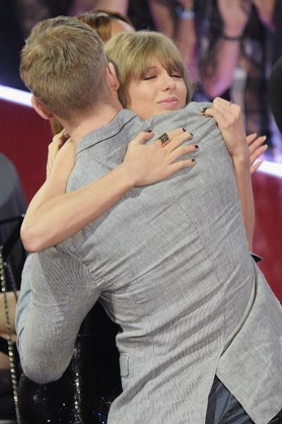 Recording artist Taylor Swift hugged Calvin Harris at the iHeartRadio Music Awards which broadcasted live on TBS, TNT, AND TRUTV from The Forum on April 3 in Inglewood, California.