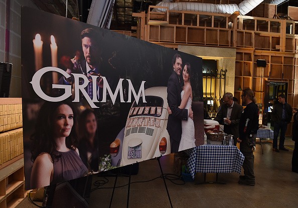 Posters line the entrance for the celebration of the 100th episode of the TV series Grimm on November 10, 2015 in Portland, Oregon.