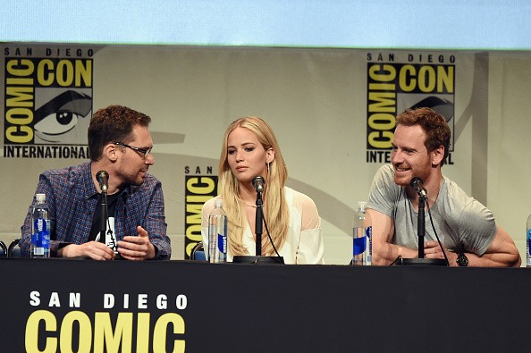  Director Bryan Singer, actress Jennifer Lawrence and actor Michael Fassbender from 'X-Men: Apocalypse' speak onstage at the 20th Century FOX panel during Comic-Con International 2015 at the San Diego Convention Center on July 11, 2015 in San Diego, Calif