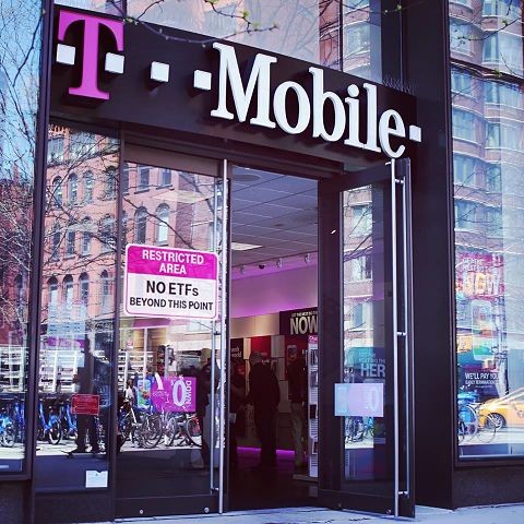 An ETFs (Early Termination Fees) sign was posted at the T-Mobile entrance.