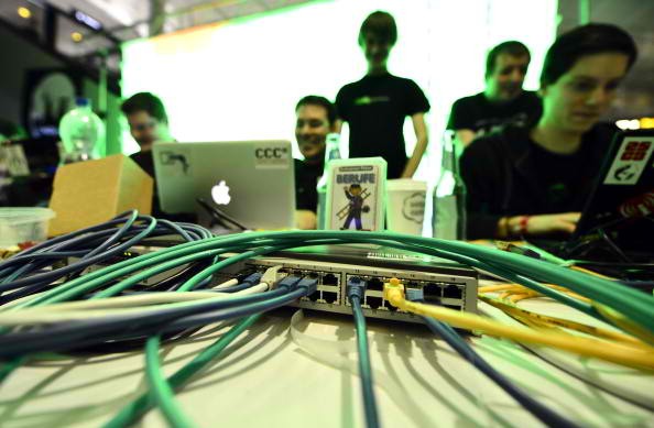  Participants work at their their laptops at the annual Chaos Computer Club (CCC) computer hackers' congress, called 29C3, on December 28, 2012 in Hamburg, Germany.