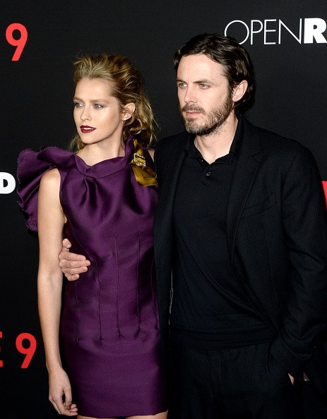 Actress Teresa Palmer and actor Casey Affleck attended the premiere of Open Road's "Triple 9" at Regal Cinemas L.A. Live on February 16 in Los Angeles, California.