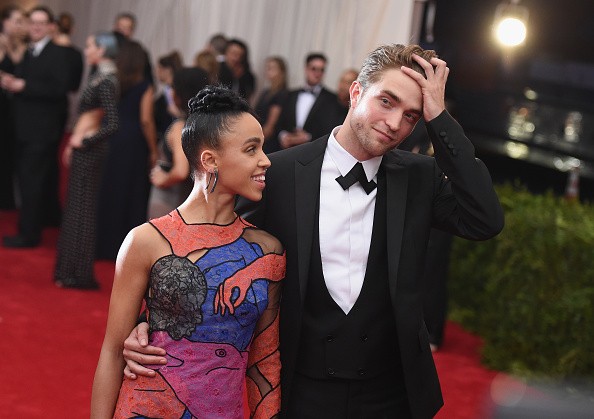 Singer-songwriter FKA Twigs (L) with fiancee "Twilight" star Robert Pattinson "China: Through The Looking Glass" Costume Institute Benefit Gala.
