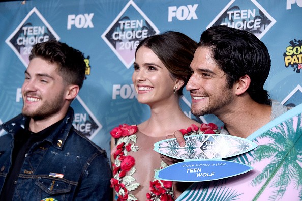 Actors Cody Christian, Shelley Hennig, and Tyler Posey posed with the Choice Summer TV Show award for "Teen Wolf" in the press room during Teen Choice Awards 2016 at The Forum on July 31 in Inglewood, California.