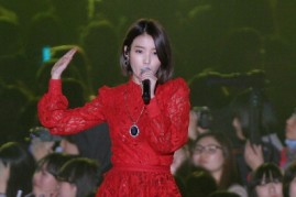IU performs onstage during the MelOn Music Awards at Olympic Gymnasium on November 14, 2013 in Seoul, South Korea.