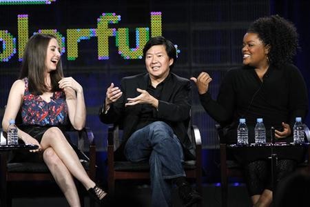 Ken Jeong (C) answers a question, as co-stars Alison Brie (L) and Yvette Nicole Brown laugh, at the NBC panel for the television series ''Community'' during the TCA winter press tour in 2011.