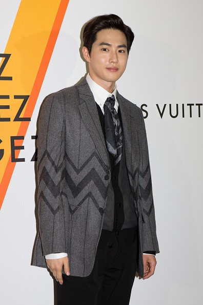 EXO member Suho in attendance during a Louis Vuitton exhibition in Japan.