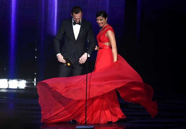 Actors Tom Hiddleston and Priyanka Chopra spoke onstage during the 68th Annual Primetime Emmy Awards at Microsoft Theater on Sept. 18 in Los Angeles, California.