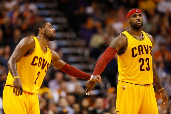 Cleveland Cavaliers players Kyrie Irving (L) and LeBron James taking the lead in this season's games