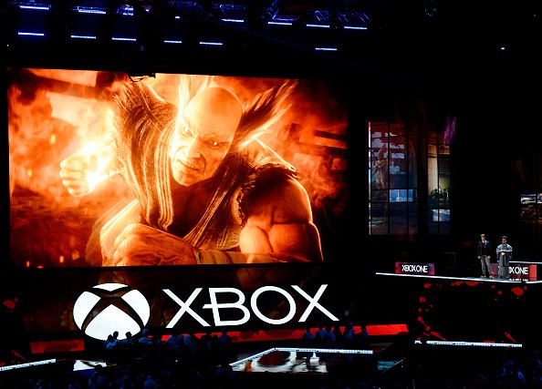 Katsuhiro Harada (R), and Michael Murray introduce 'Tekken7' video game during Microsoft Corp. Xbox at the Galen Center on June 13, 2016 in Los Angeles, California. 