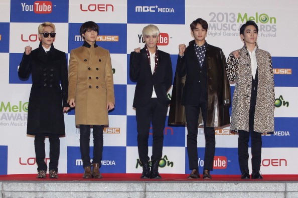 SHINee members attend the 2013 MelOn Music Awards in Seoul, South Korea.