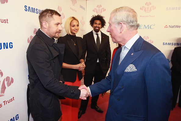 Prince Charles, Prince of Wales met actor Tom Hardy as Alesha Dixon and David Haye look as they attended The Prince's Trust Celebrate Success Awards at London Palladium on March 7 in London, England.