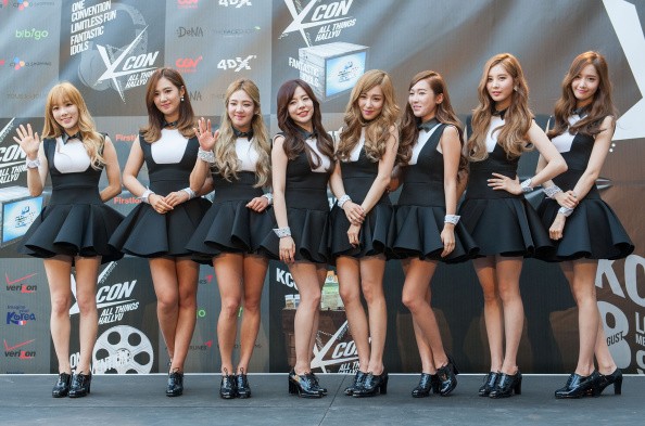Girls' Generation poses upon their arrival at the 2014 KCON in Los Angeles, California.