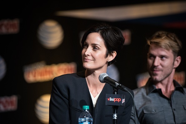  Carrie-Ann Moss and Wil Traval attend the Netflix Presents The Casts Of Marvel's Daredevil And Marvel's Jessica Jones At New York Comic-Con at Jacob Javits Center on October 10, 2015 in New York City. 