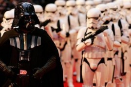 Actors portraying Darth Vader and Storm Troopers arrive for the UK premiere of the Star Wars film in London