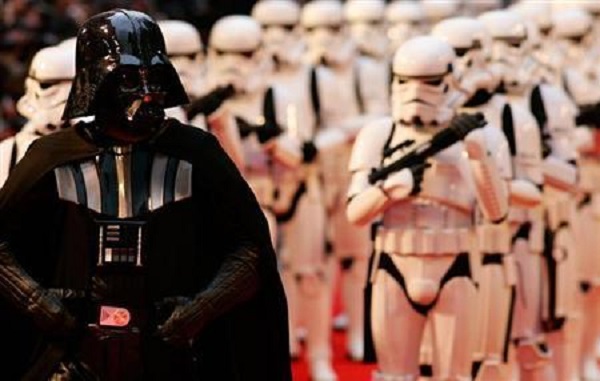 Actors portraying Darth Vader and Storm Troopers arrive for the UK premiere of the Star Wars film in London