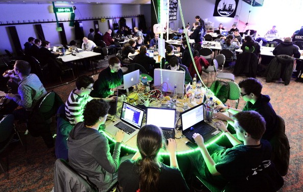Participants work at their laptops at the annual Chaos Computer Club (CCC) computer hackers' congress, called 29C3, on December 28, 2012 in Hamburg, Germany. 