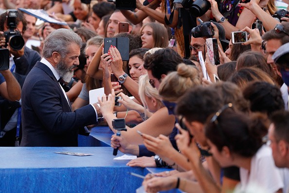 Director Mel Gibson signed autographs at the premiere of “Hacksaw Ridge” during the 73rd Venice Film Festival at Sala Grande on Sept. 4 in Venice, Italy. 