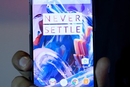 Vikas Agarwal, General Manager for Indian of the OnePlus cellphone company holds a newly-launched OnePlus 3 mobile at an event in New Delhi on June 15, 2016.