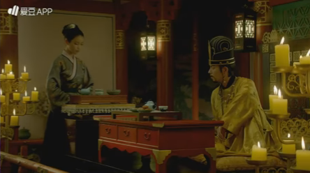 A scene where Hae-Soo serves the new king some tea.