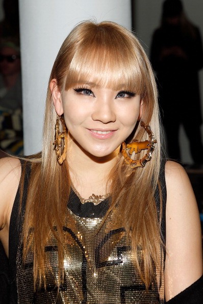 Singer CL 2ne1 attends the Jeremy Scott fall 2013 fashion show during MADE fashion week at Milk Studios
