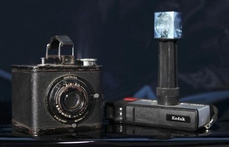 The image presents the classic Eastman Kodak cameras. 