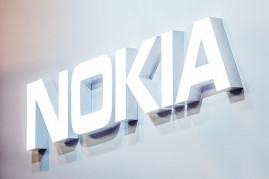 A logo sits illuminated outside the Nokia pavilion on the opening day of the World Mobile Congress at the Fira Gran Via Complex on February 22, 2016 in Barcelona, Spain