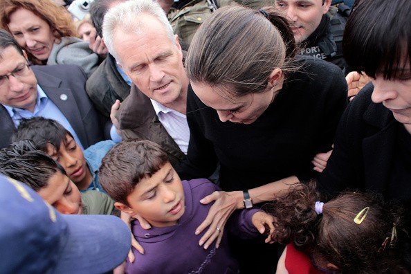 Special envoy of the United Nations High Commissioner for Refugees, Angelina Jolie talked to young migrants during her visit to the temporary refugee facilities at the port of Piraeus on March 16 in Athens, Greece.