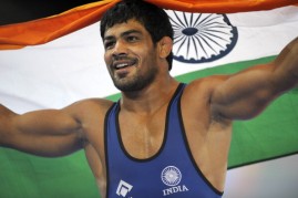 Sushil Kumar of India celebrates winning the men's 74kg freestyle Wrestling gold medal match at the 2014 Commonwealth Games in Glasgow, Scotland on July 29, 2014.