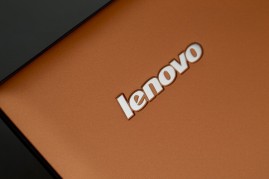 A Lenovo Group Ltd. logo is displayed on a IdeaPad Yogo 2 Pro as it sits on display in this arranged photograph at a Lenovo store in the Sha Tin district of Hong Kong, China, on Friday, Feb. 7, 2014. Lenovo, which has headquarters in Beijing and Morrisvil