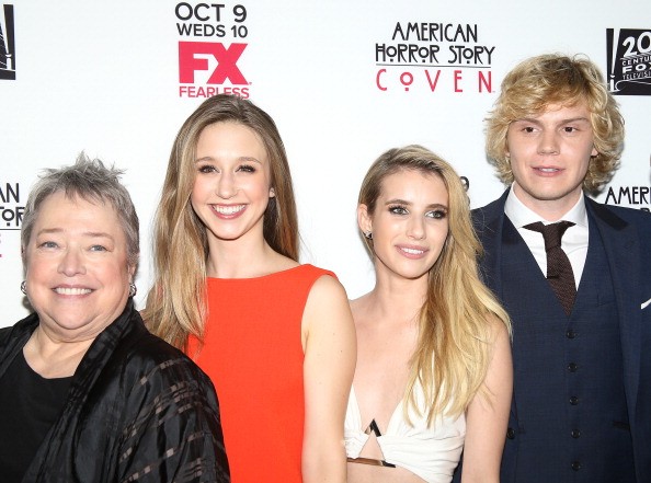  Kathy Bates, Taissa Farmiga, Emma Roberts and Evan Peters arrive at the premiere of FX's 'American Horror Story: Coven' held at Pacific Design Center on October 5, 2013 in West Hollywood, California. 