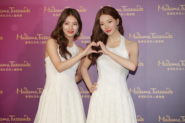 KPop star Suzy poses with her wax figure in Hong Kong.