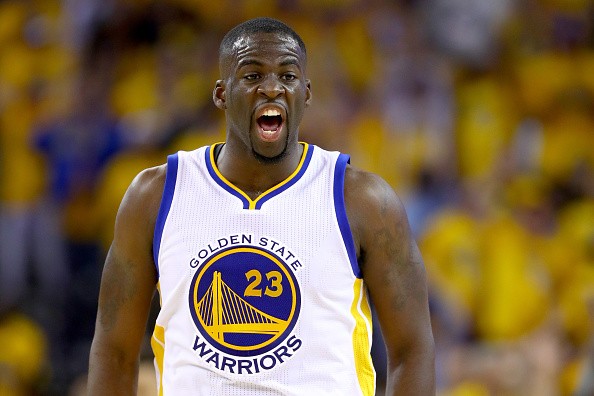 Draymond Green of the Golden State Warriors reacts after a three-point basket against the Cleveland Cavaliers in Game 7 of the 2016 NBA Finals at ORACLE Arena on June 19, 2016 in Oakland, California. 