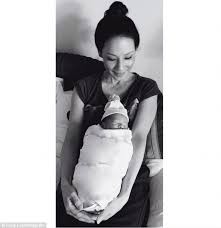 "Kung Fu Panda 3" star Lucy Liu is seen  here with her child.