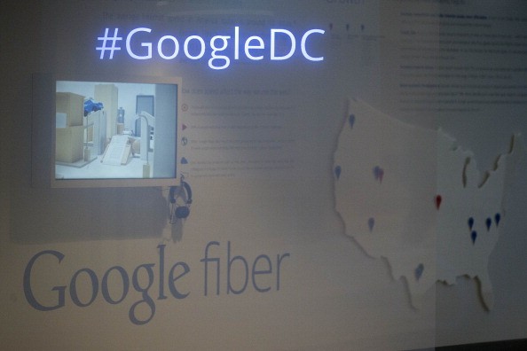 A #GoogleDC sign and Google Inc. Fiber signage is displayed at the Google Inc. office in Washington, D.C., U.S., on Tuesday, July 15, 2014.