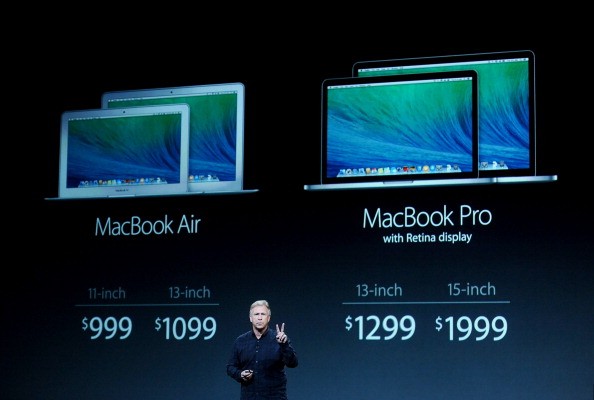 Philip Schiller, senior vice president of worldwide marketing at Apple Inc., unveils the MacBook Air and MacBook Pro laptops during a press event at the Yerba Buena Center in San Francisco, California, U.S., on Tuesday, Oct. 22, 2013. Apple Inc. is expect