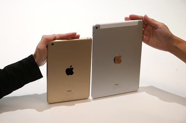  The new iPad Air 2 (R) and iPad Mini 3 are displayed during an Apple special event on October 16, 2014 in Cupertino, California. Apple unveiled the new iPad Air 2 and iPad Mini 3 tablets and the iMac with 5K retina display. 