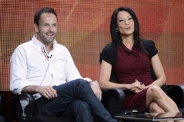 Cast members Jonny Lee Miller (L) and Lucy Liu participate in a panel for CBS series ''Elementary'' during the CBS sessions at the Television Critics Association summer press tour in Beverly Hills, California July 29, 2012.