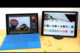 The image shows the Apple iPad Pro and Microsoft Surface Pro 4. 